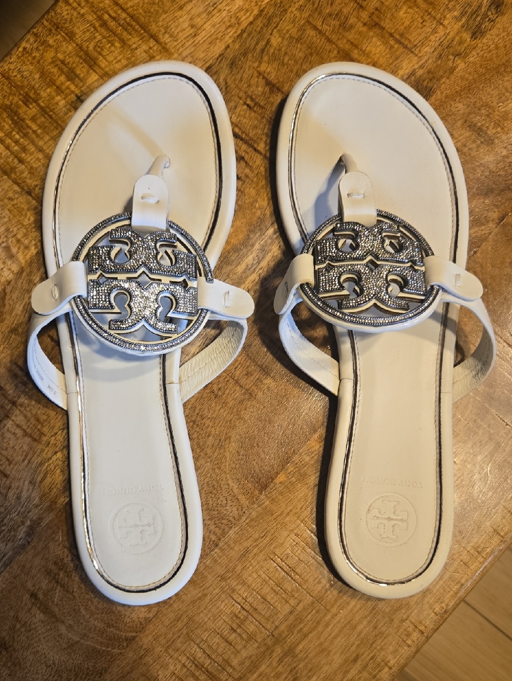 Tory Burch White Leather Logo Thong Sandals with Silver Emblem